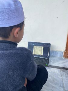 Boy Learning Online from Pakistan
