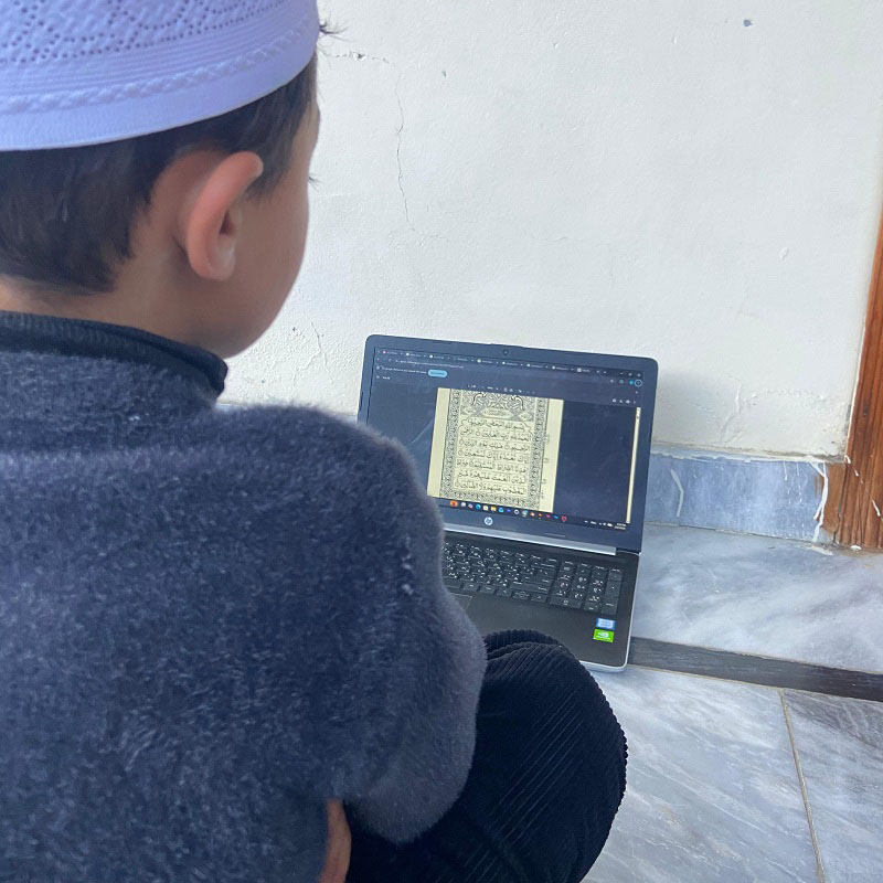boy-reciting-Quran